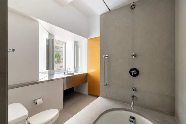 a bathroom with a sink and a bathtub