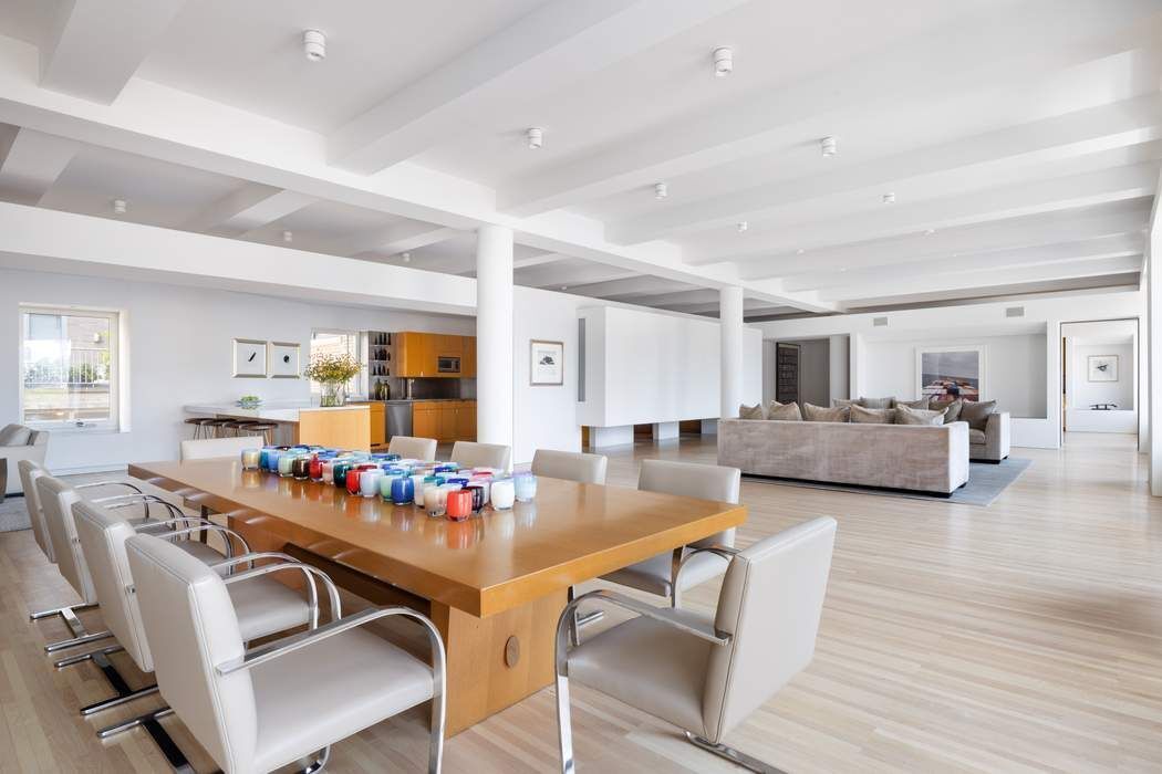 227 West 17th Street, Unit 7 Manhattan, NY 10011 - Photo 4 of 23 a view of a dining room with furniture and wooden floor