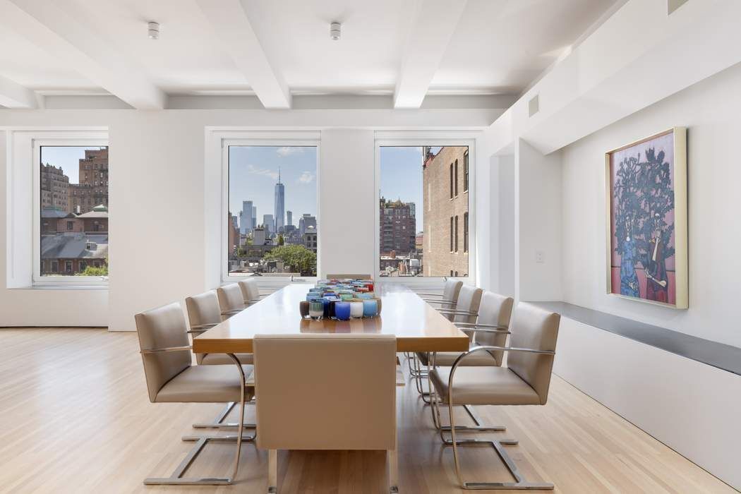 227 West 17th Street, Unit 7 Manhattan, NY 10011 - Photo 5 of 23 a dining room with furniture and wooden floor