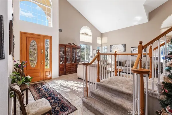 a kitchen with cabinets and window