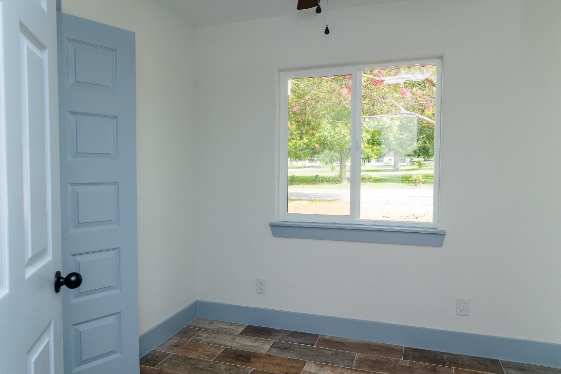811 Matchett Street Brenham, TX 77833 - Photo 17 of 18 a view of a bathroom with a window