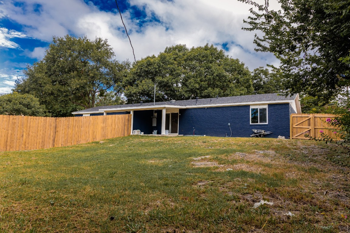811 Matchett Street Brenham, TX 77833 - Photo 18 of 18 a backyard of a house with lots of green space