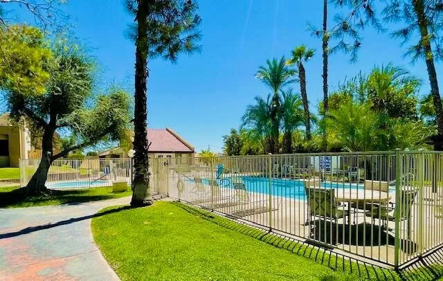 a view of a deck with a backyard