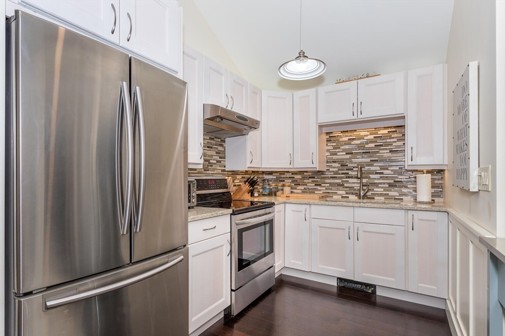32 Billings Street, Unit 32R Sharon, MA 02067 - Photo 10 of 17 a kitchen with stainless steel appliances a refrigerator sink and cabinets