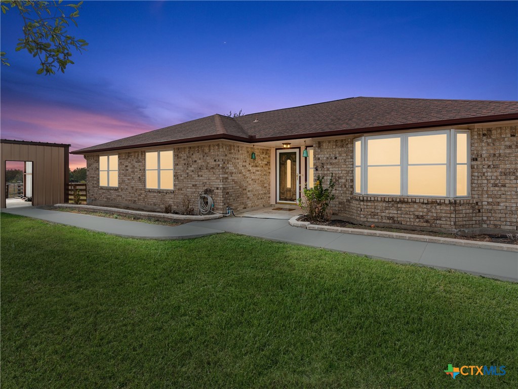 782 Santa Clara Loop Marion, TX 78124 - Photo 3 of 48 a front view of a house with a yard
