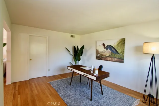 a view of a livingroom with furniture and a couch
