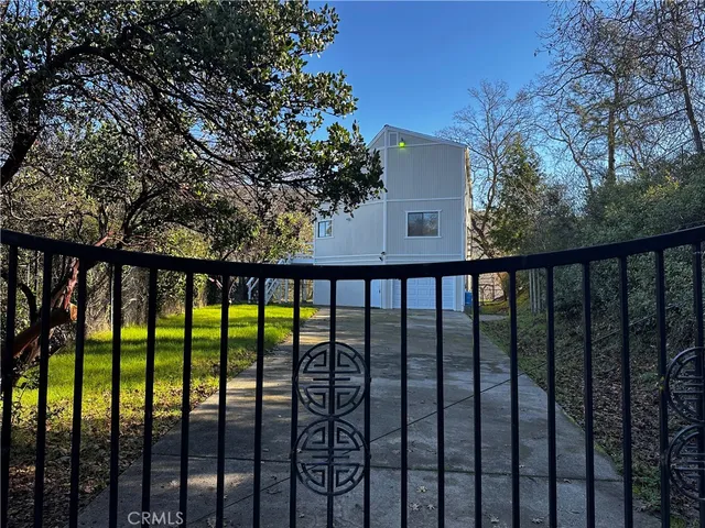 a view of a small yard from a balcony