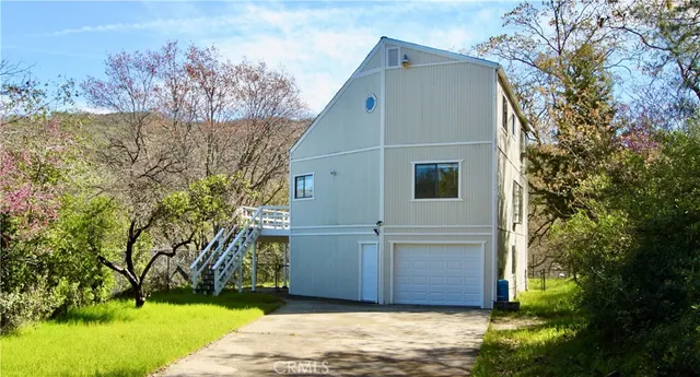 a house with trees in front of it