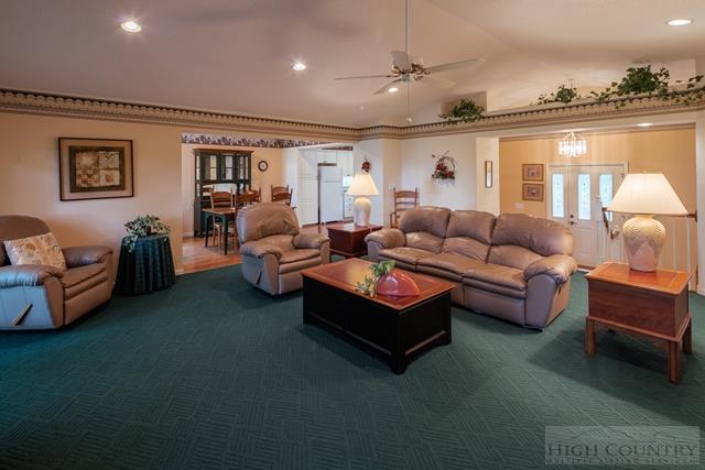 605 Pine Ridge Road Beech Mountain, NC 28604 - Photo 44 of 45 a living room with furniture and a large window