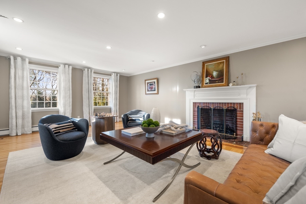 84 Royalston Road Wellesley, MA 02481 - Photo 2 of 42 a living room with furniture and a fireplace