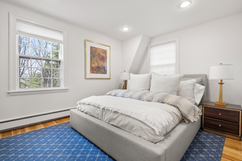 84 Royalston Road Wellesley, MA 02481 - Photo 38 of 42 a bed room with a bed and a window