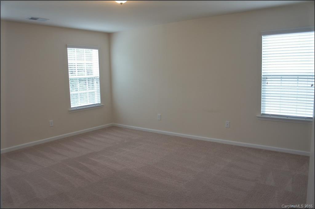 78194 Rillstone Drive, Unit 226 Lancaster, SC 29720 - Photo 12 of 19 an empty room with a window