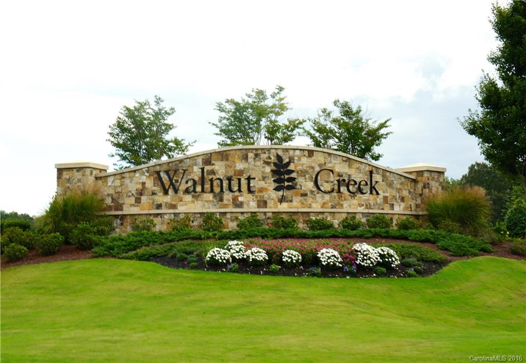 78194 Rillstone Drive, Unit 226 Lancaster, SC 29720 - Photo 19 of 19 a view of a sign board with garden