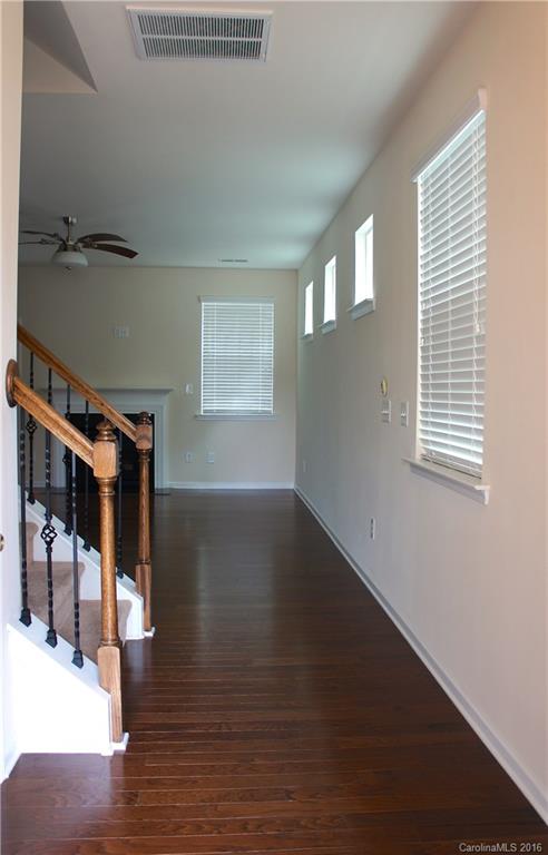 78194 Rillstone Drive, Unit 226 Lancaster, SC 29720 - Photo 3 of 19 a view of entryway and hall with wooden floor