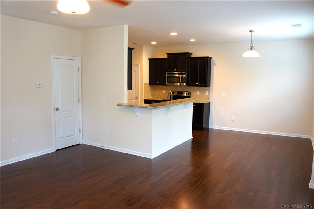 78194 Rillstone Drive, Unit 226 Lancaster, SC 29720 - Photo 5 of 19 a view of kitchen with microwave and stove