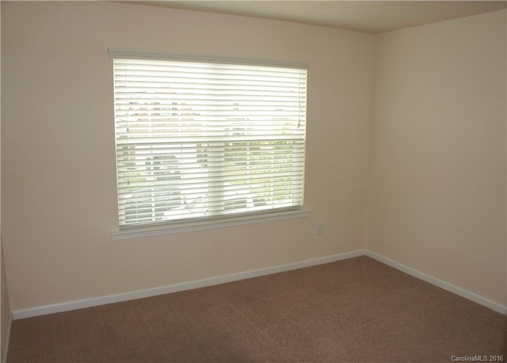 78194 Rillstone Drive, Unit 226 Lancaster, SC 29720 - Photo 8 of 19 an empty room with a window
