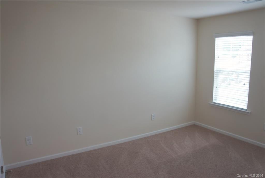 78194 Rillstone Drive, Unit 226 Lancaster, SC 29720 - Photo 9 of 19 an empty room with a window