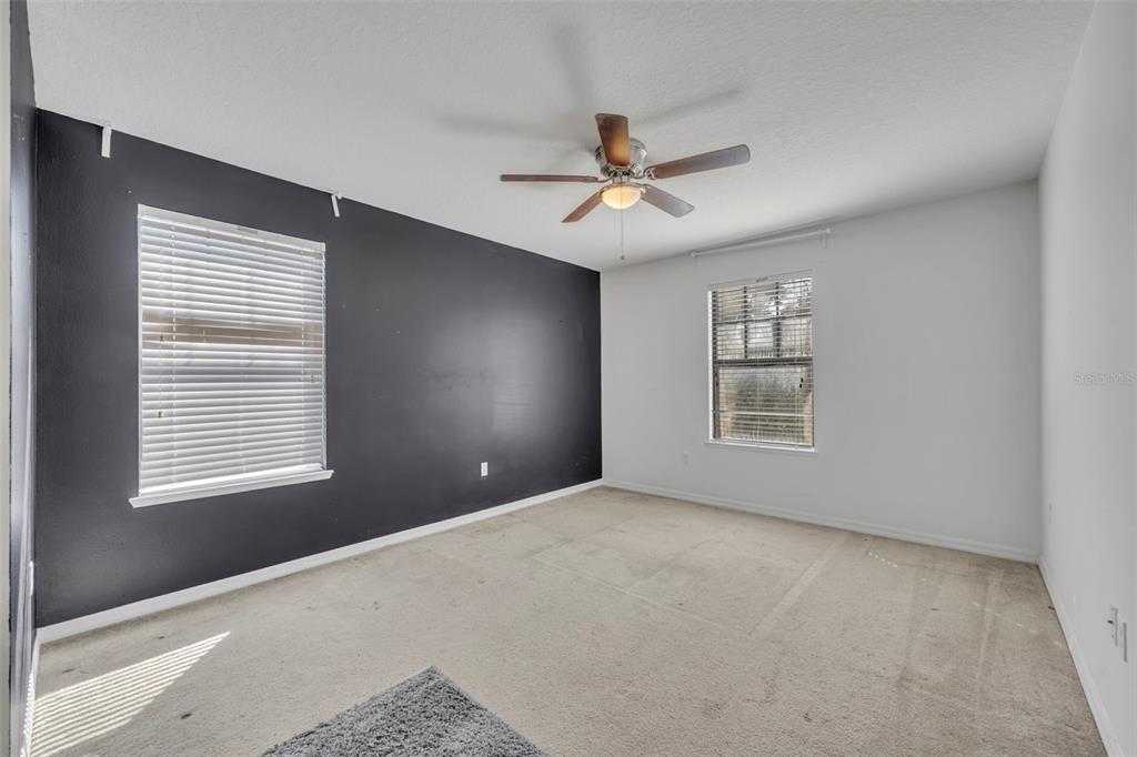 4277 Bugle Street Clermont, FL 34711 - Photo 30 of 35 a view of an empty room with a window