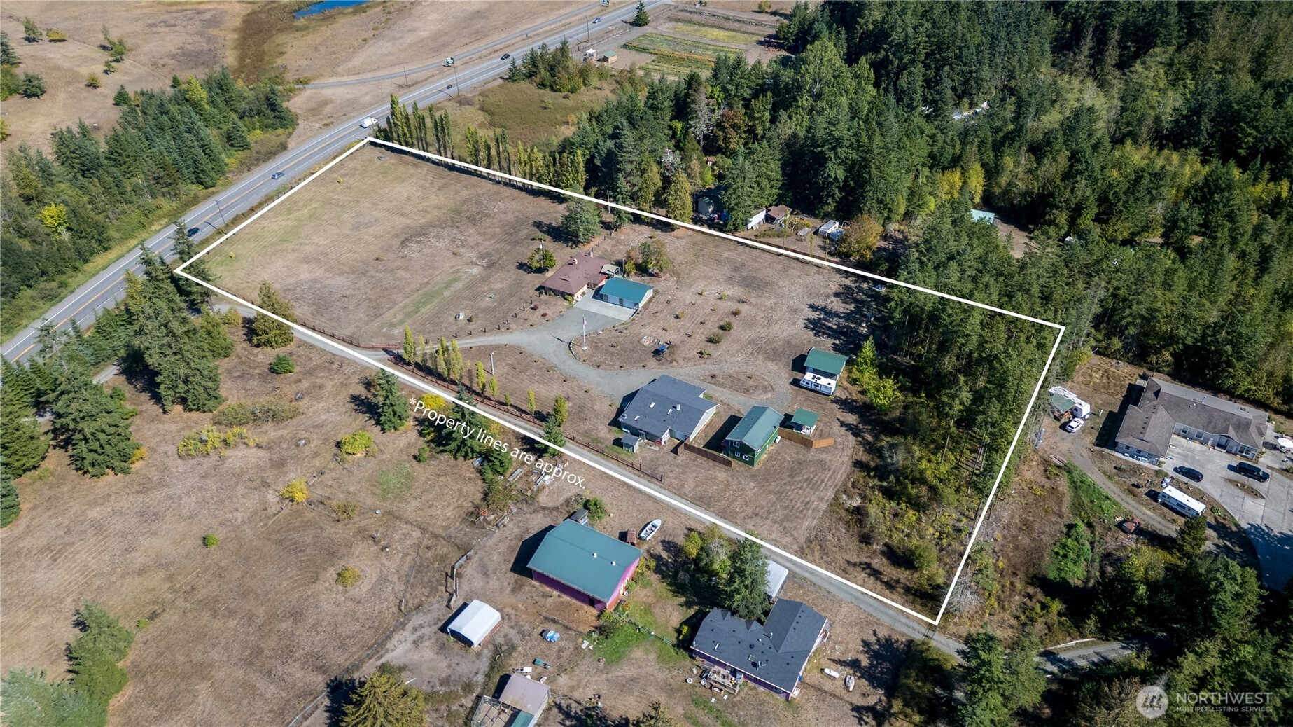 273702 Highway 101 Sequim, WA 98382 - Photo 3 of 40 an aerial view of house with yard
