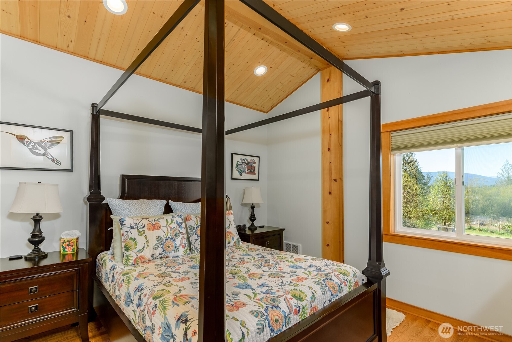 273702 Highway 101 Sequim, WA 98382 - Photo 33 of 40 a bedroom with a bed and a window