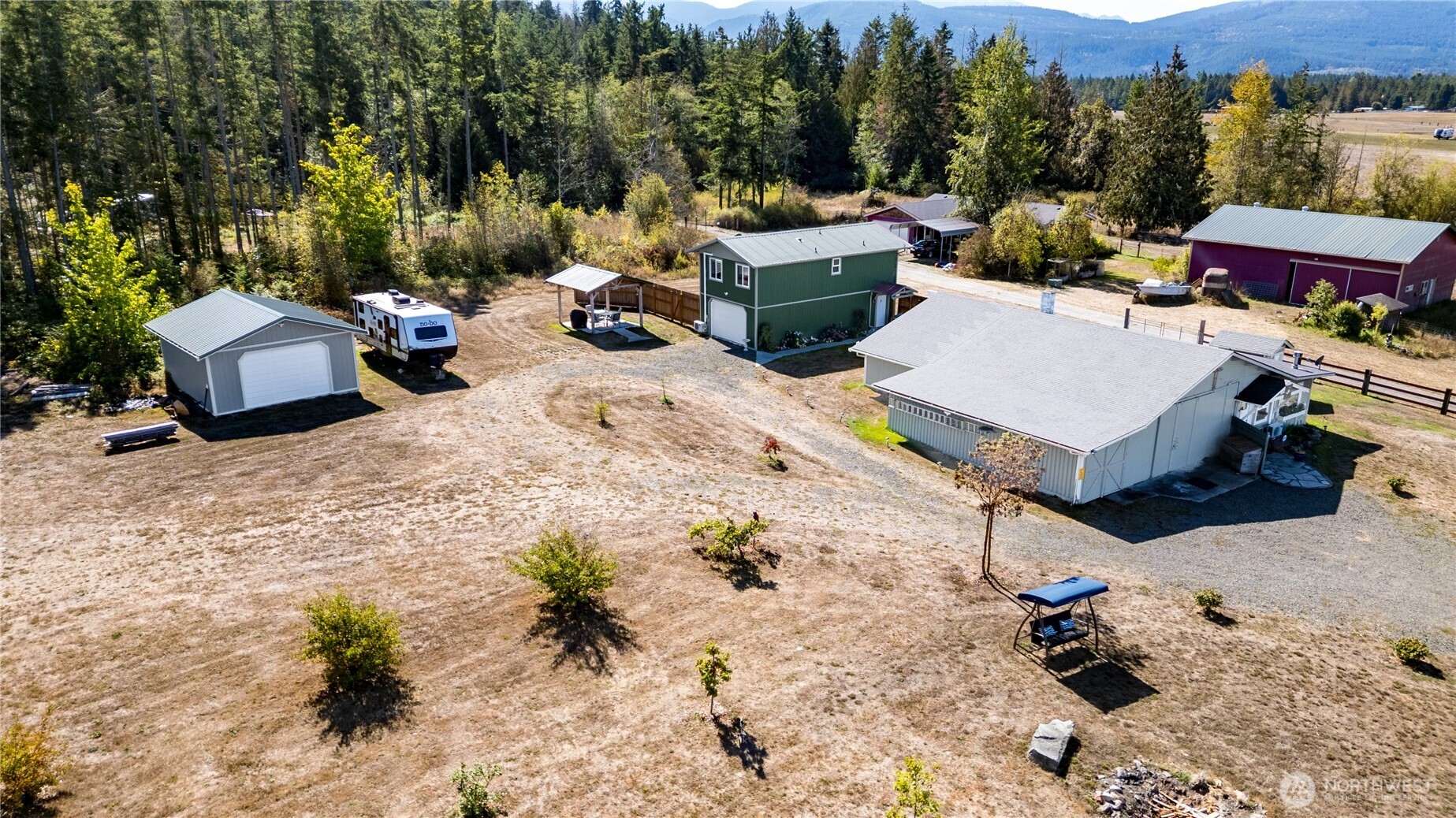 273702 Highway 101 Sequim, WA 98382 - Photo 39 of 40 a view of a terrace with sitting area