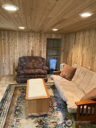 a bedroom with furniture and window