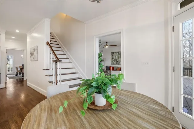 a view of balcony with wooden floor and fence