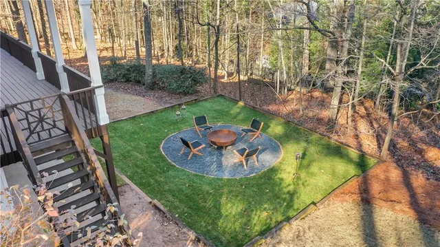 a kitchen with a stove top oven sink and cabinets