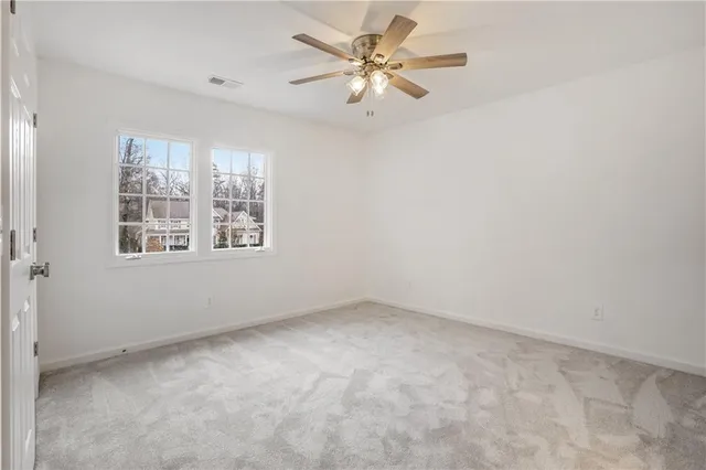 a room with furniture and wooden floor