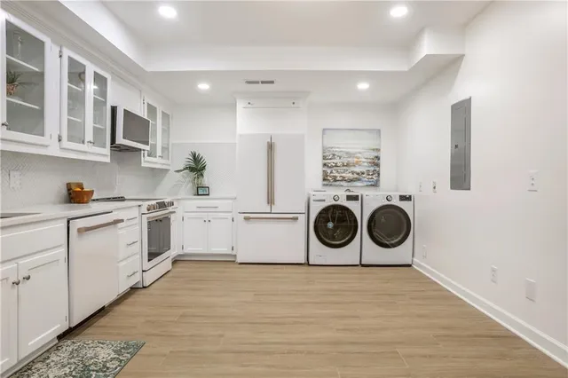 a view of a backyard with a table and chairs