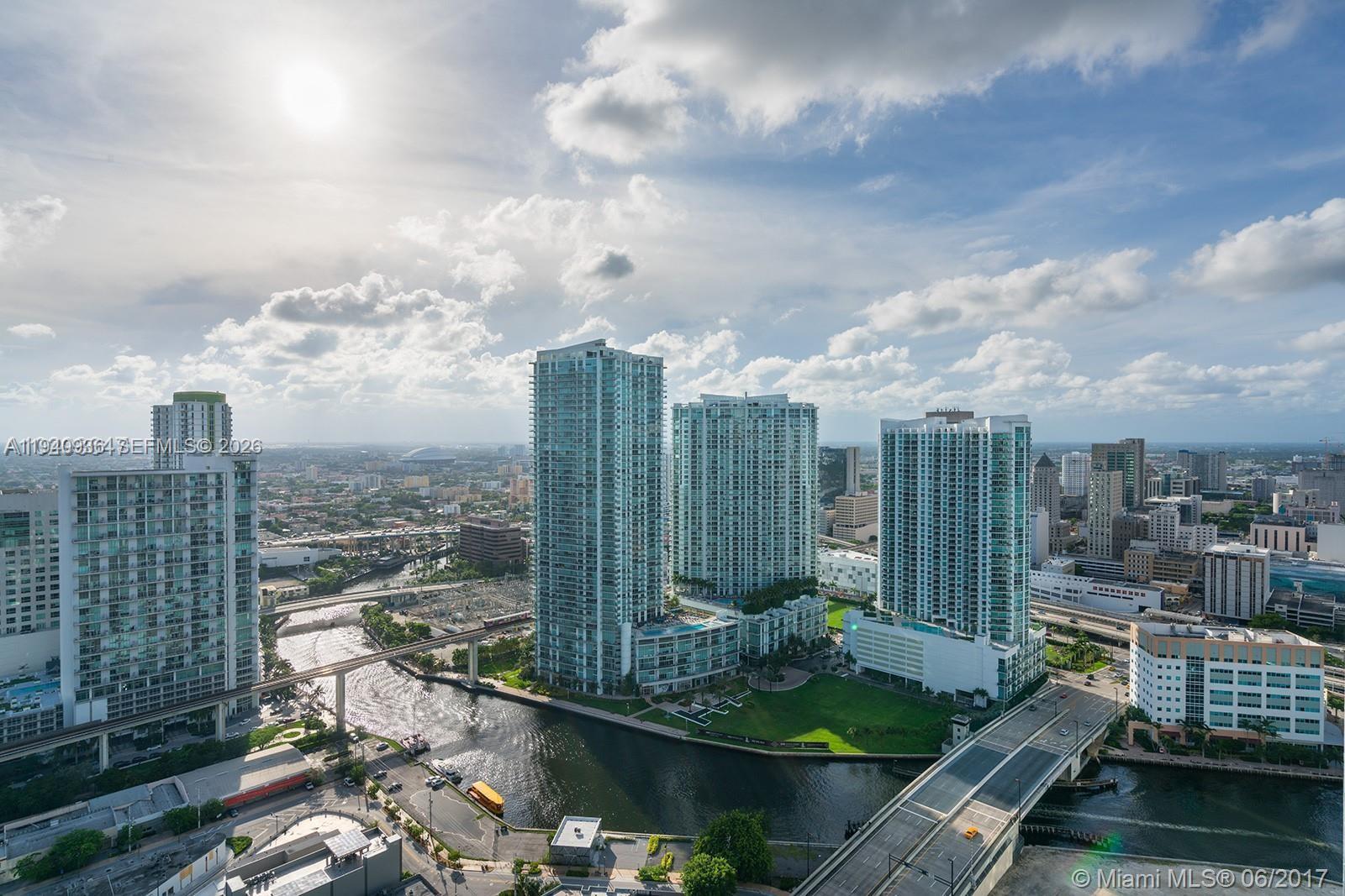 a view of a city with tall buildings