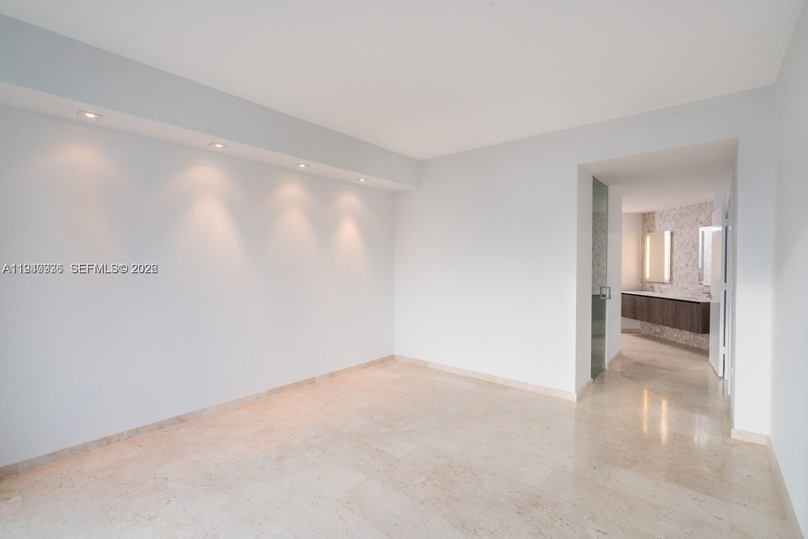 68 Southeast 6th Street, Unit 3402 Miami, FL 33131 - Photo 8 of 22 a view of an empty room