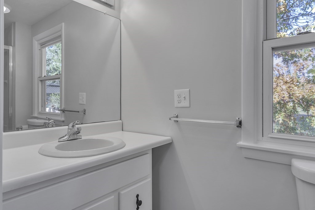 121 Herrman Street West Springfield, MA 01089 - Photo 5 of 40 a bathroom with a sink and a window
