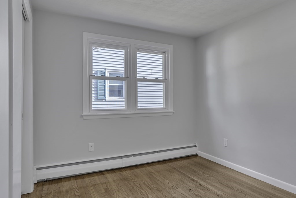 121 Herrman Street West Springfield, MA 01089 - Photo 7 of 40 wooden floor in an empty room with a window