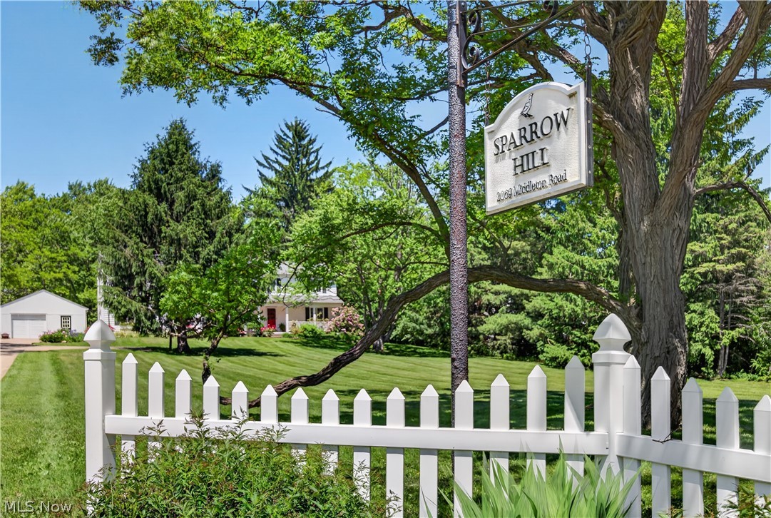 2069 Middleton Road Hudson, OH 44236 - Photo 2 of 42 A welcoming sign from the front white picket fence