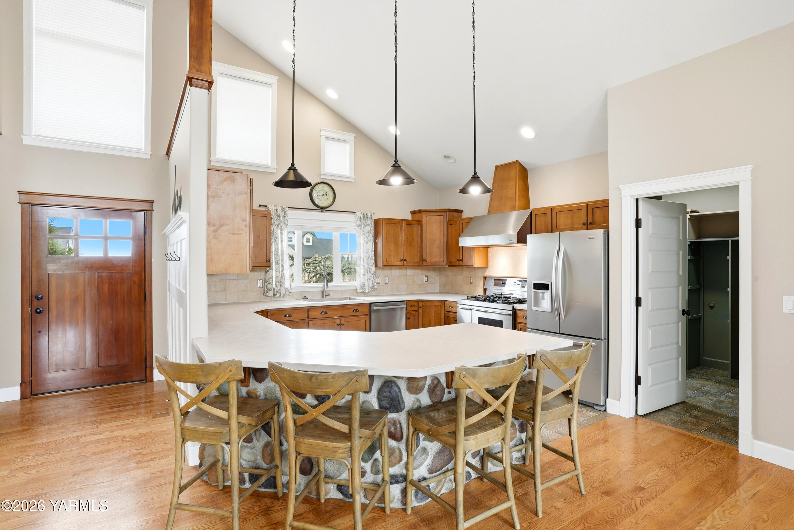 230 Albro Road Sunnyside, WA 98944 - Photo 8 of 46 a dining table chairs and a kitchen counter space