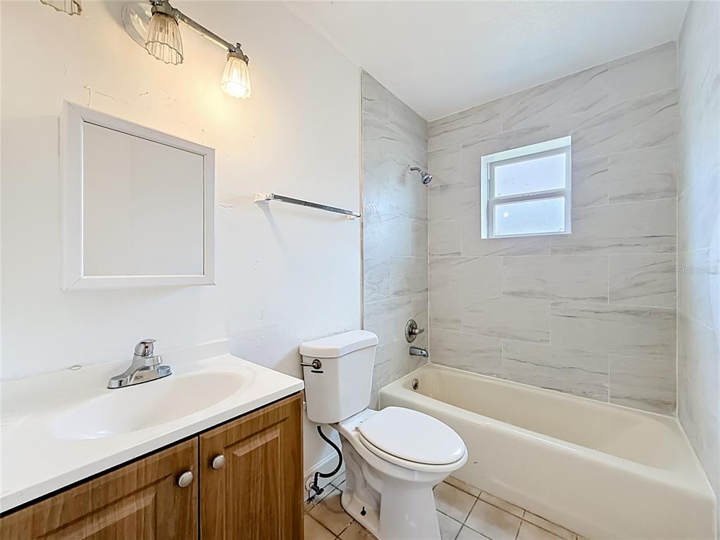 3 Bahia Pl Loop Ocala, FL 34472 - Photo 20 of 31 a bathroom with a sink a toilet and shower