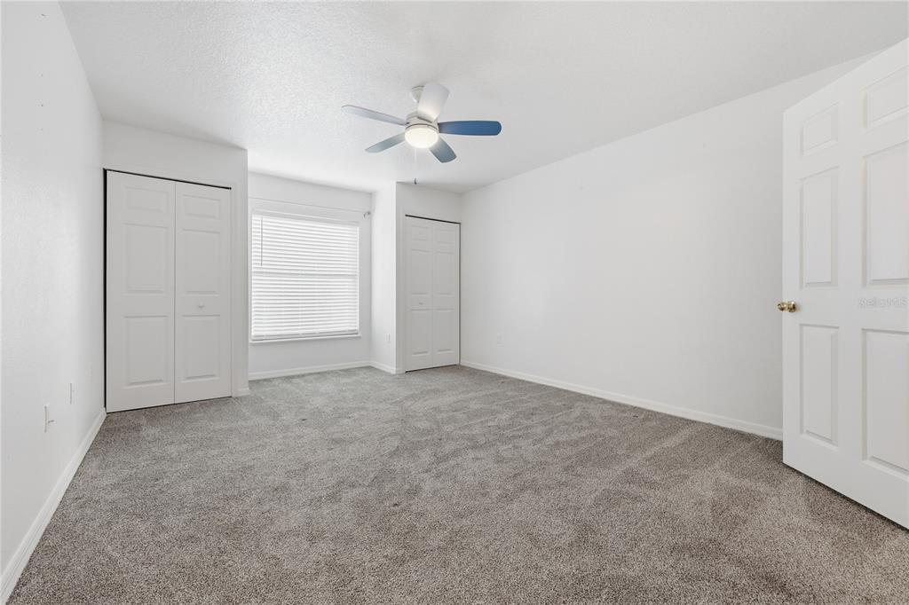 1348 Southwest 245th Way Newberry, FL 32669 - Photo 23 of 38 an empty room with closet and windows