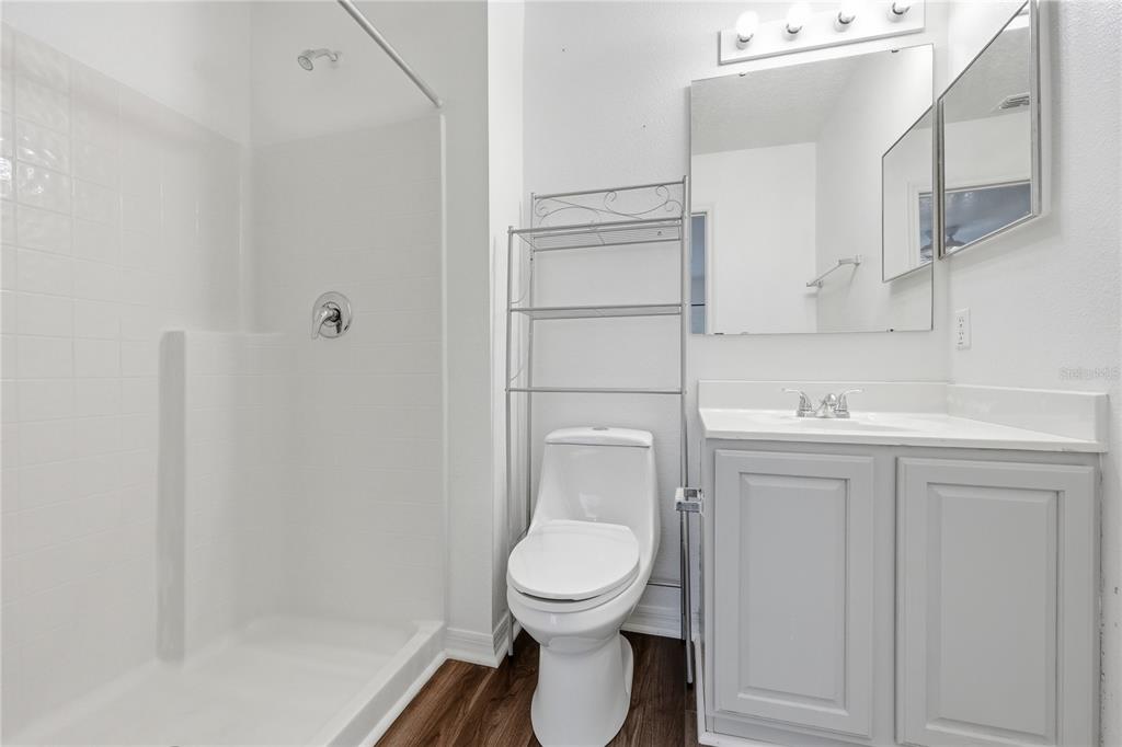 1348 Southwest 245th Way Newberry, FL 32669 - Photo 26 of 38 a white toilet sitting next to a bathroom sink