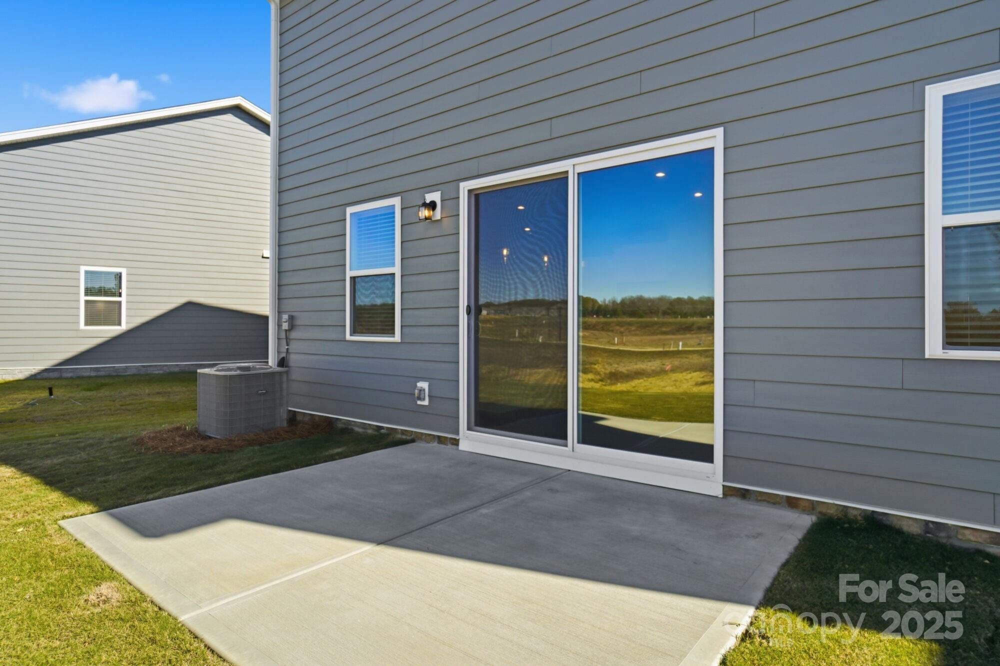 2664 Tillman Street Monroe, NC 28112 - Photo 20 of 25 a front view of a house with a yard