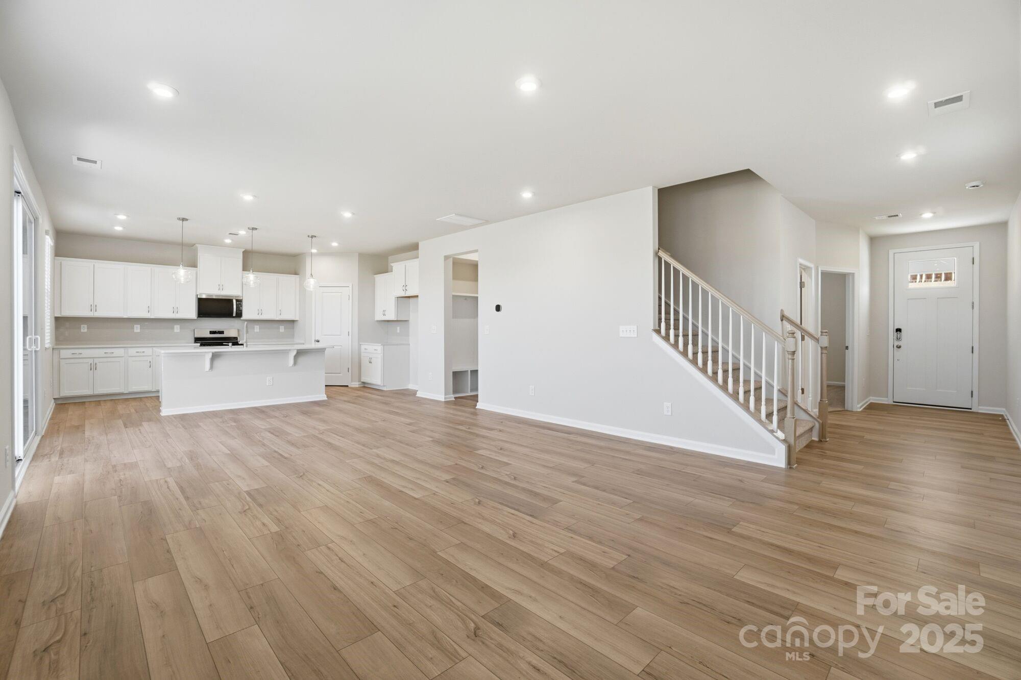 2664 Tillman Street Monroe, NC 28112 - Photo 10 of 25 a view of a kitchen with a sink and a refrigerator