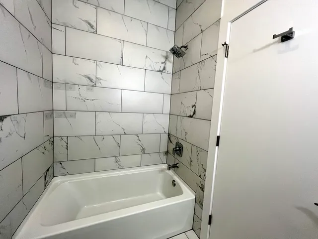 a bathroom with a bathtub