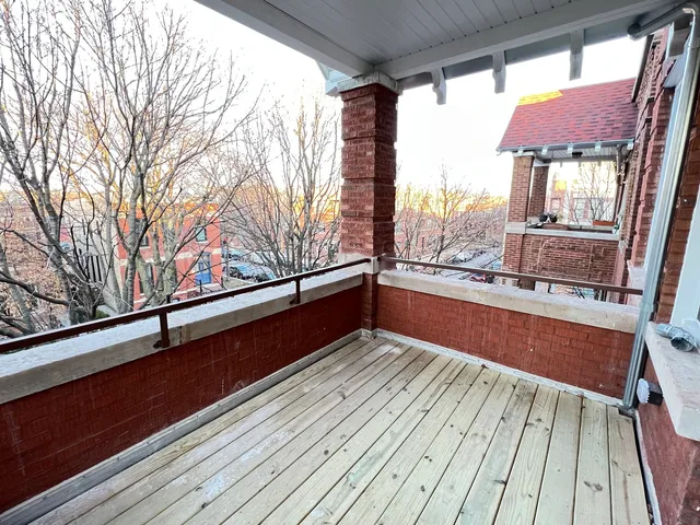 a view of railway station with wooden floor