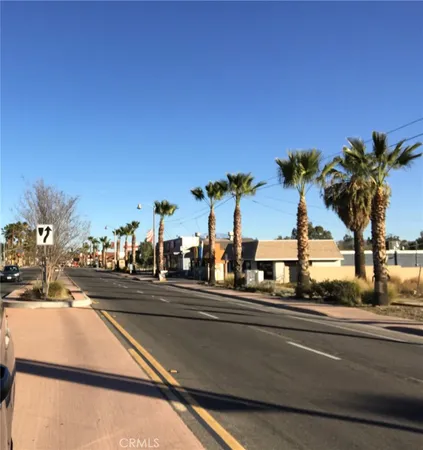 a view of a city street from a balcony