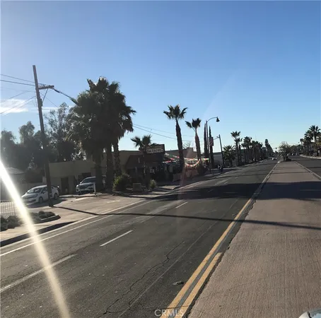 a view of a street with houses
