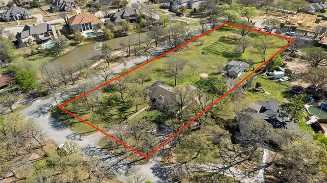 an aerial view of waterside residential houses