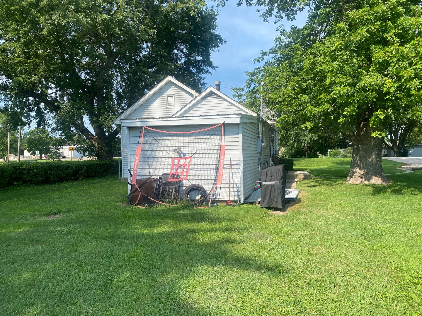414 South Main Street Cherry, IL 61317 - Photo 4 of 18 a front view of a house with yard and green space