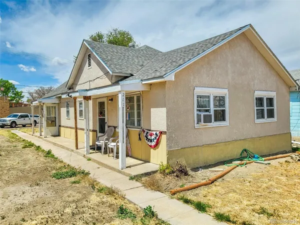 a front view of a house with a patio