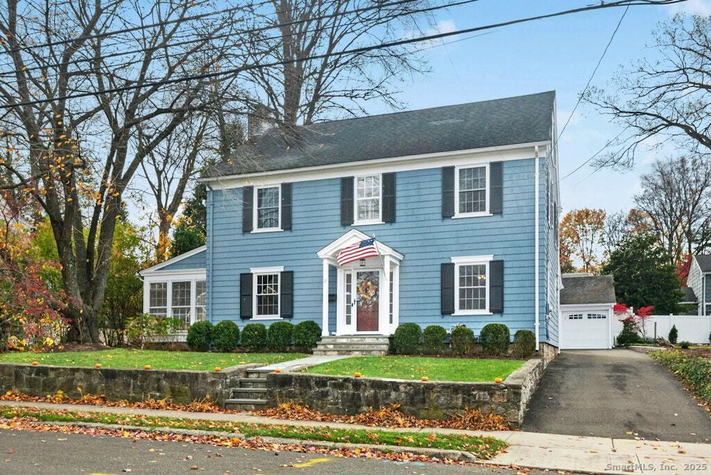 front front view of a house with a yard