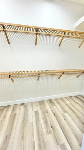 a view of a swimming pool and an outdoor space